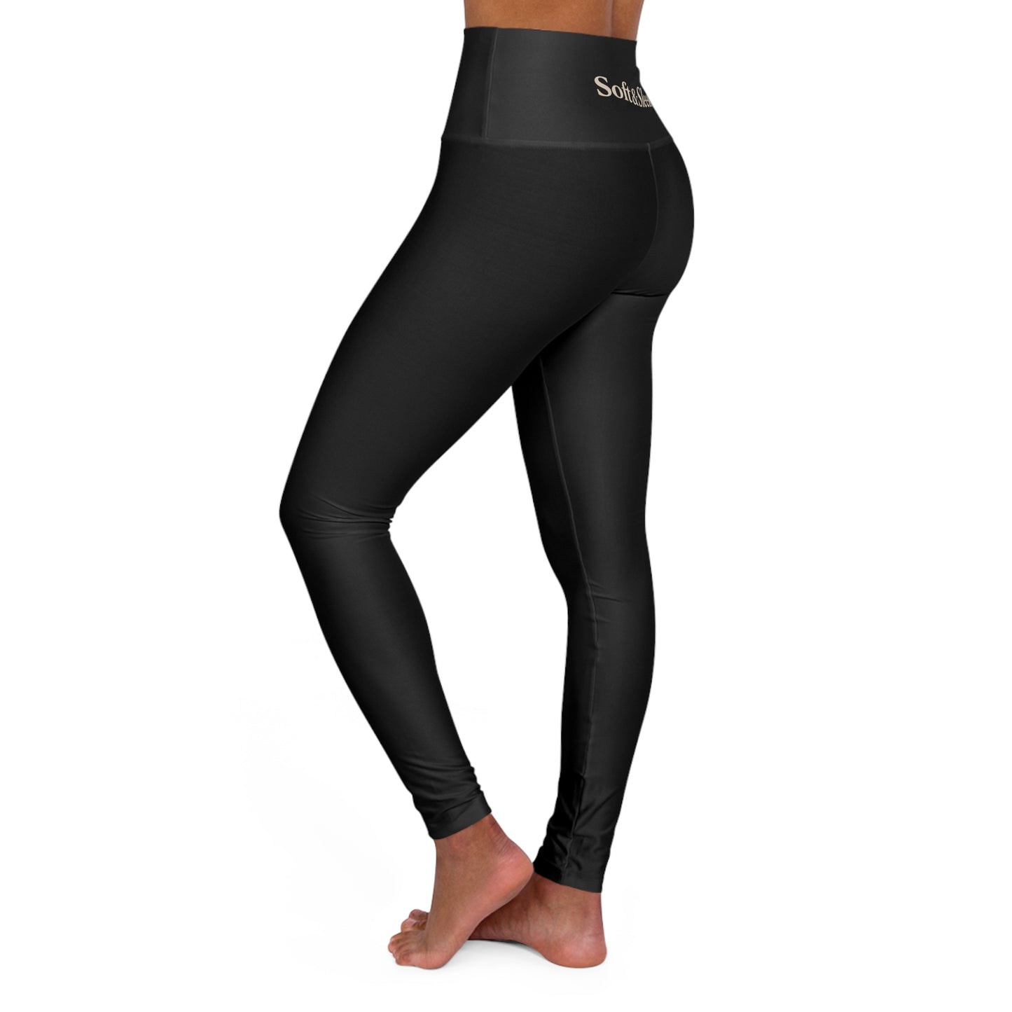Side view of black Soft & Sleek leggings showing figure-hugging fit and waistband.