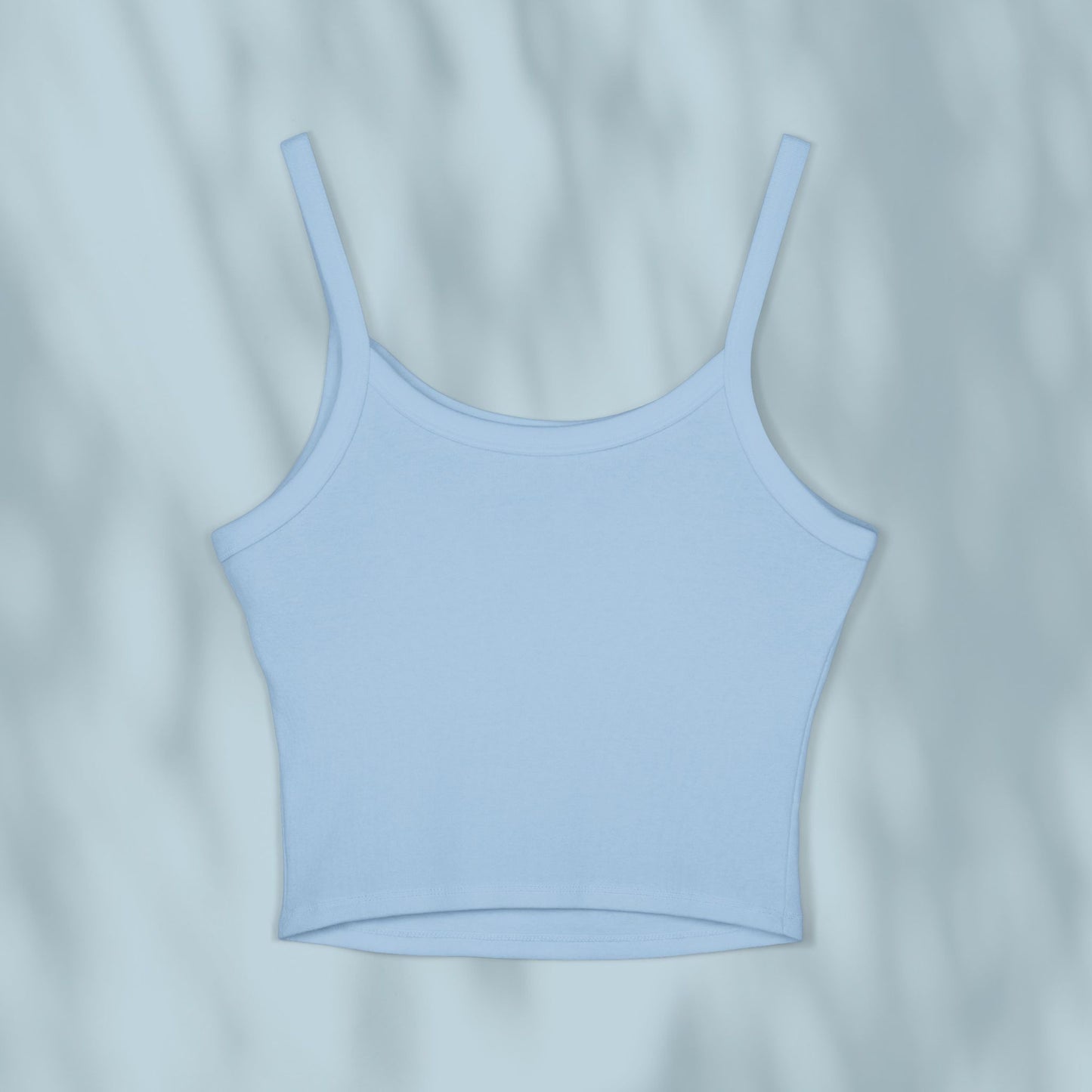 Light blue tank top on a light gray background