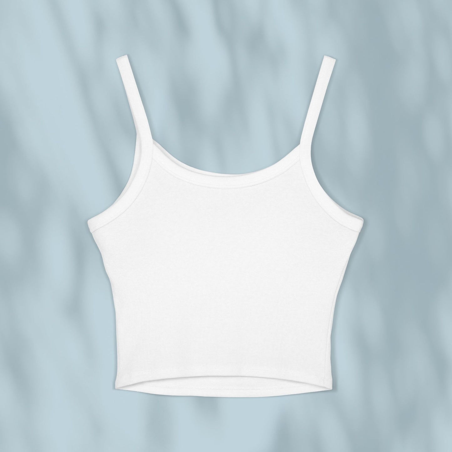 White tank top on a light blue background