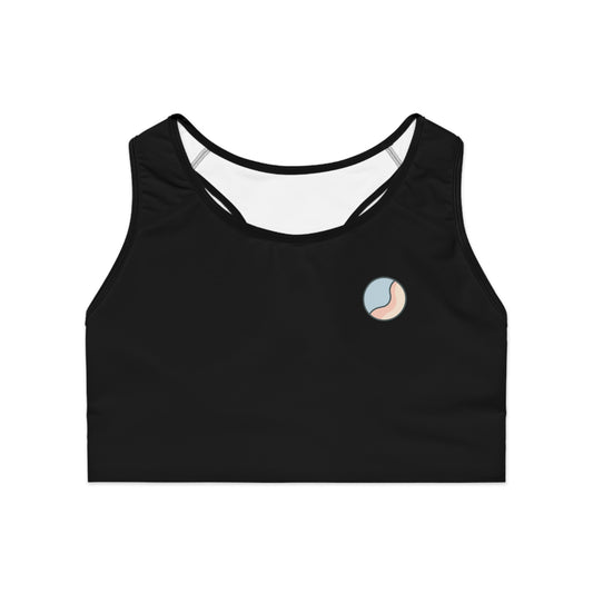 Front flat lay of black Soft & Sleek sports bra with circular emblem on the chest.