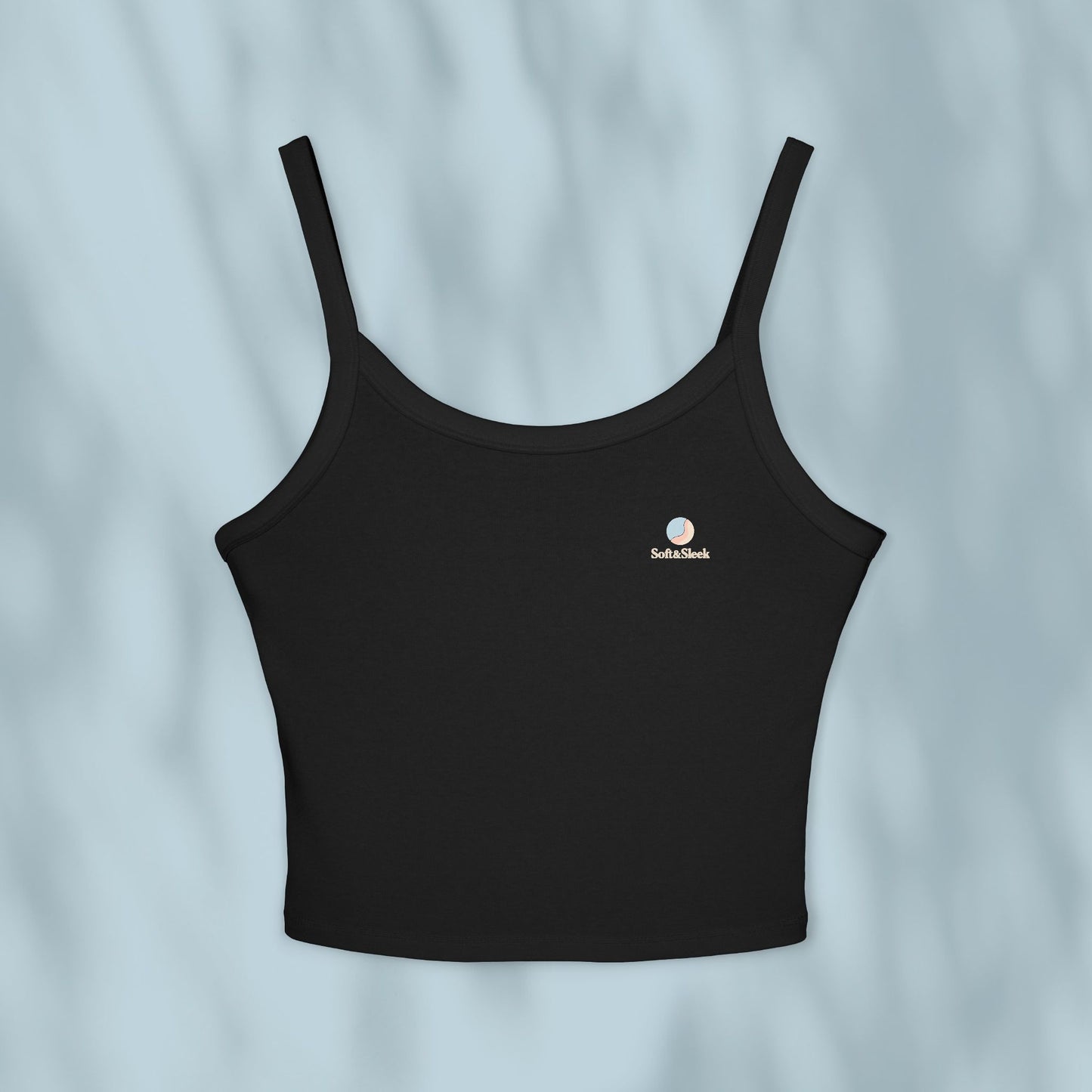Black tank top with a logo on a light gray background