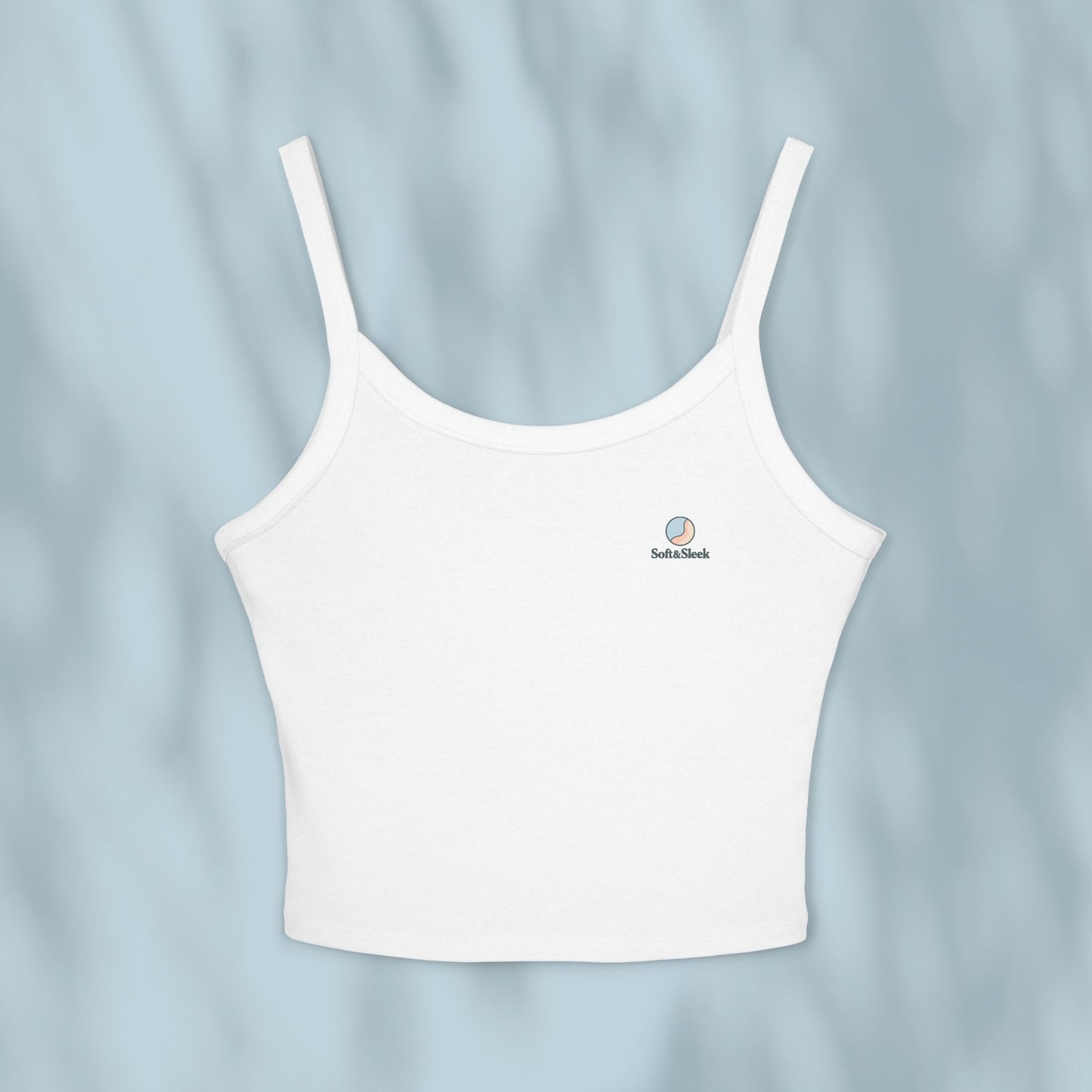 White camisole on a light blue background