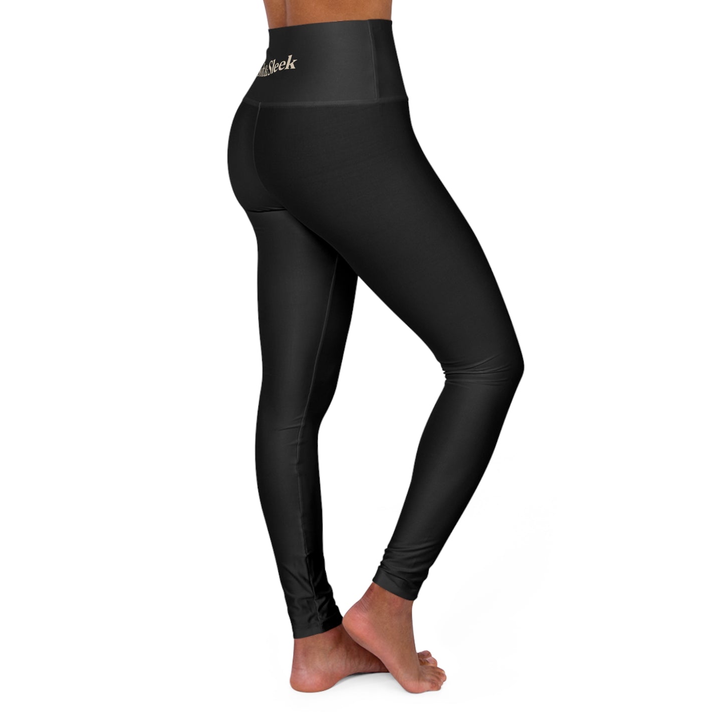 Angled rear-side view of black Soft & Sleek leggings highlighting contour and stretch fabric.