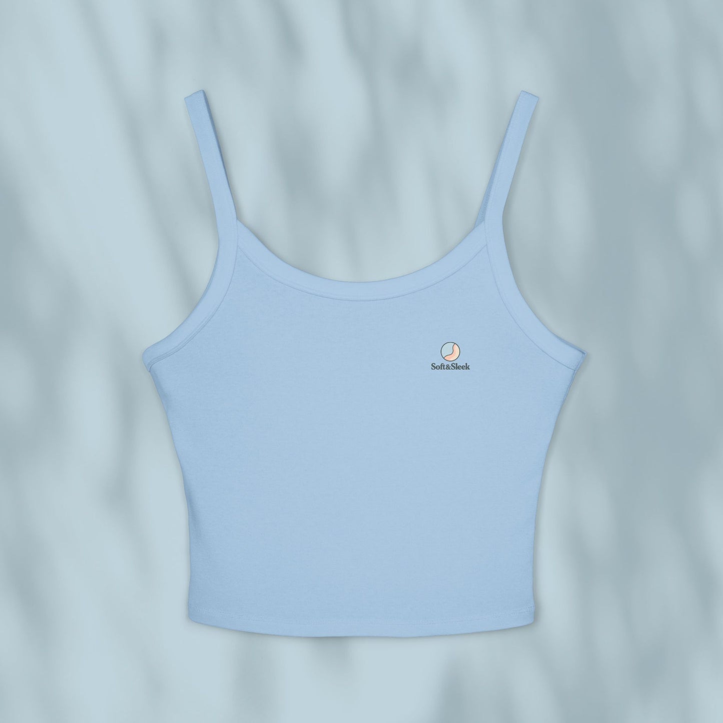 Light blue tank top with a brand logo on a light gray background