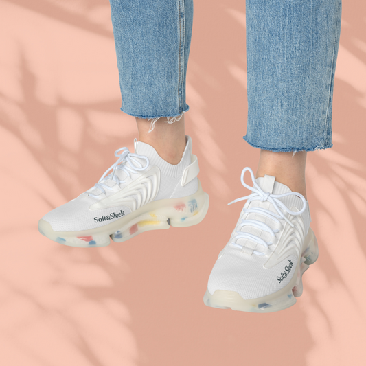 White sneakers with colorful sole on a peach background