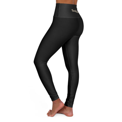 Side view of black Soft & Sleek leggings showing figure-hugging fit and waistband.