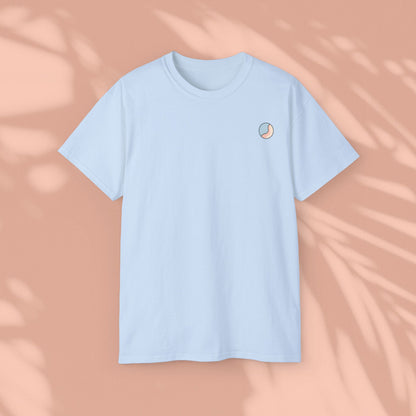 Light blue Soft & Sleek t-shirt, plain front, peach background