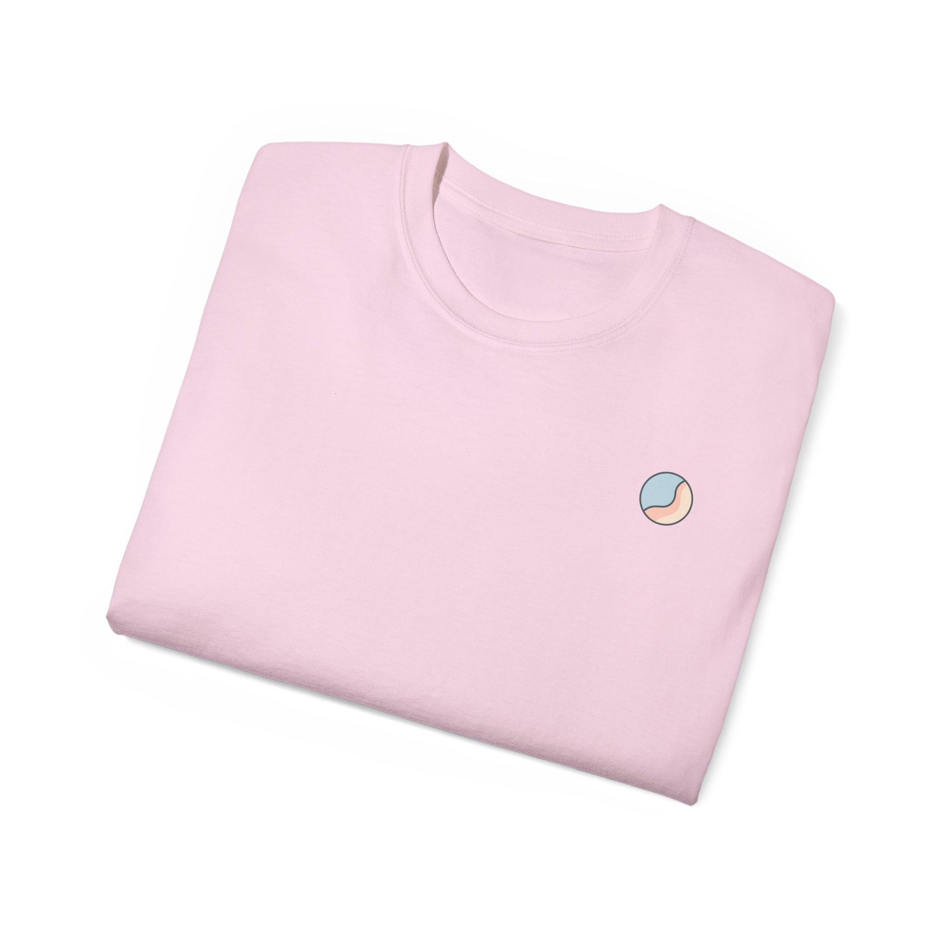 Folded light pink Soft & Sleek t-shirt with emblem