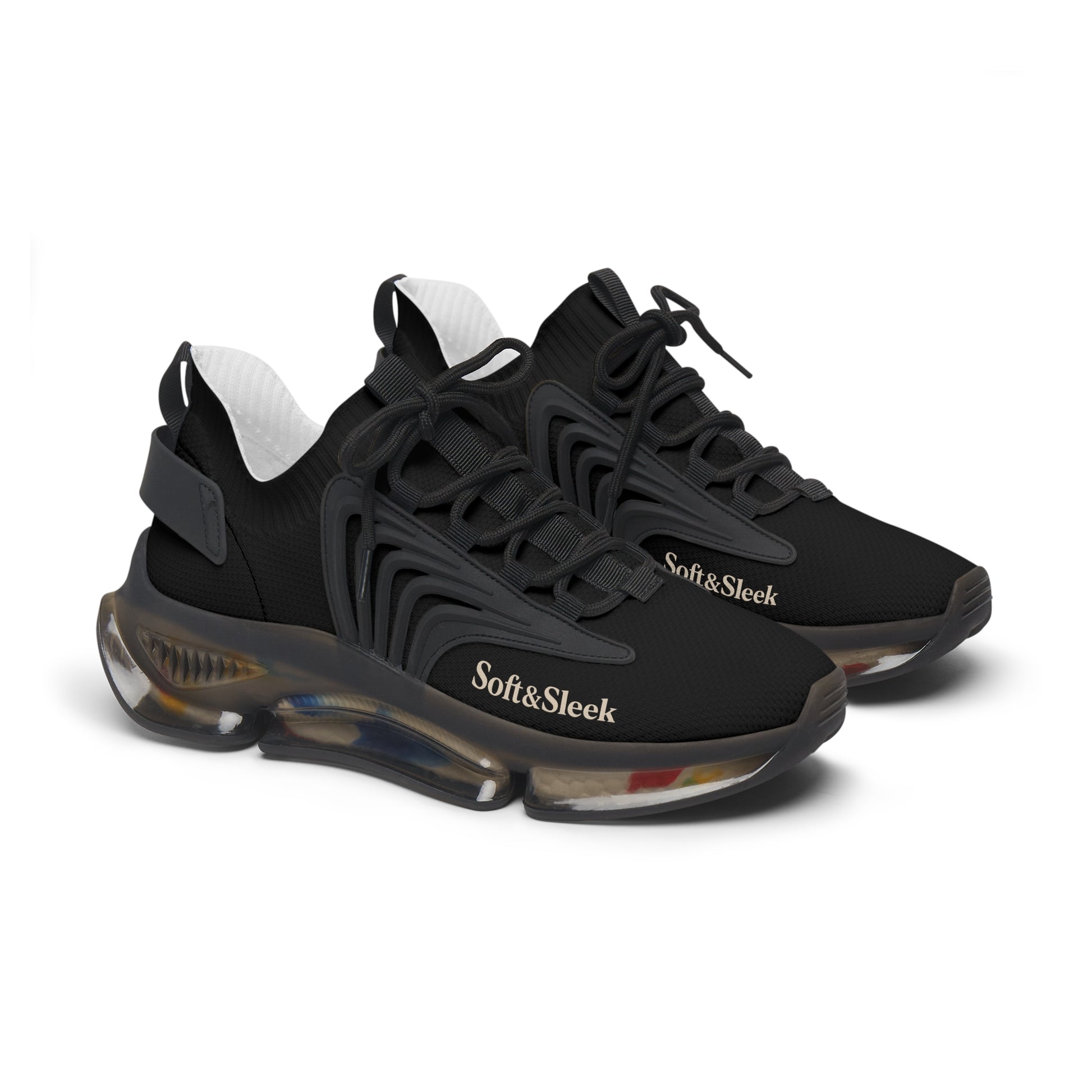 Angled front-side view of black Soft & Sleek trainers on white background.