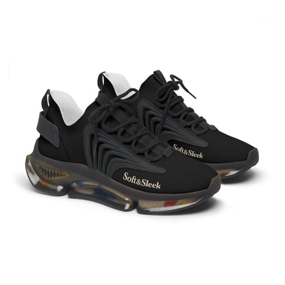 Angled front-side view of black Soft & Sleek trainers on white background.