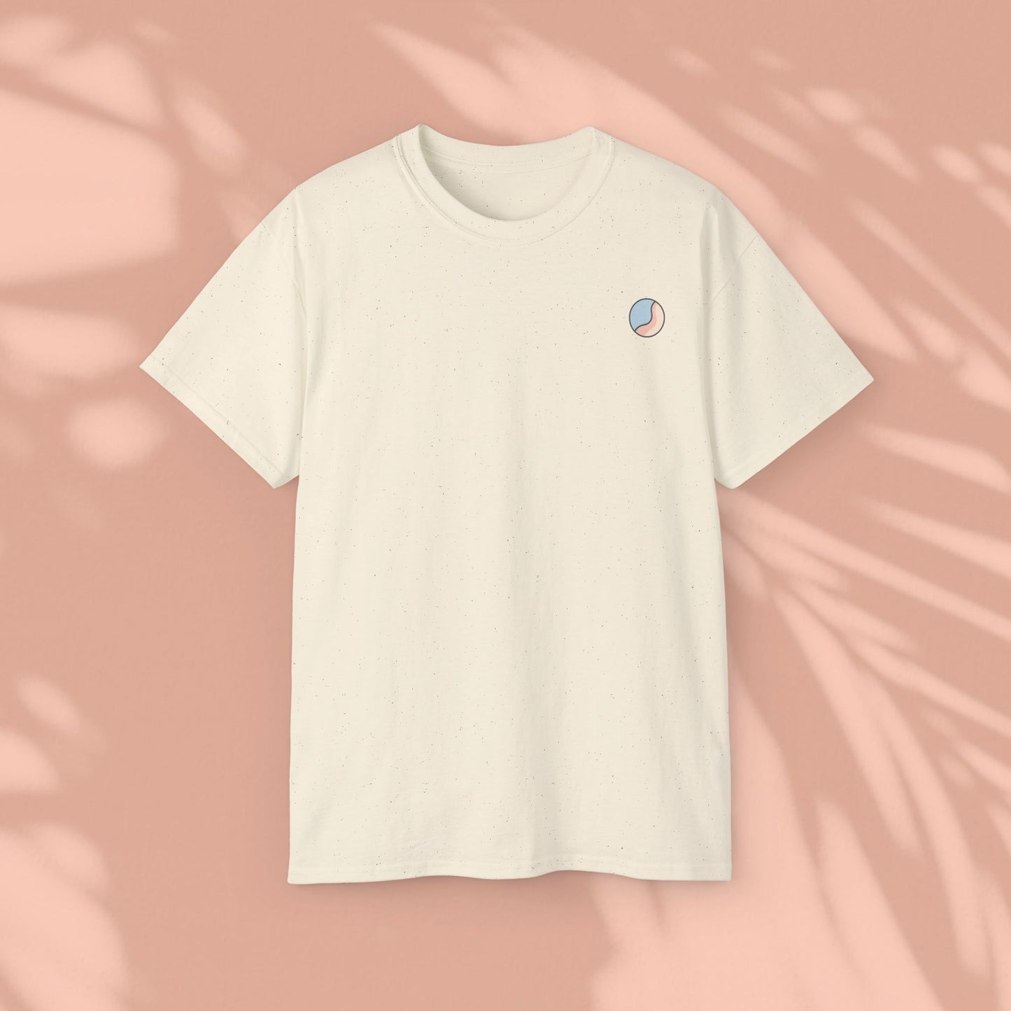 Beige Soft & Sleek t-shirt with circular emblem, peach background