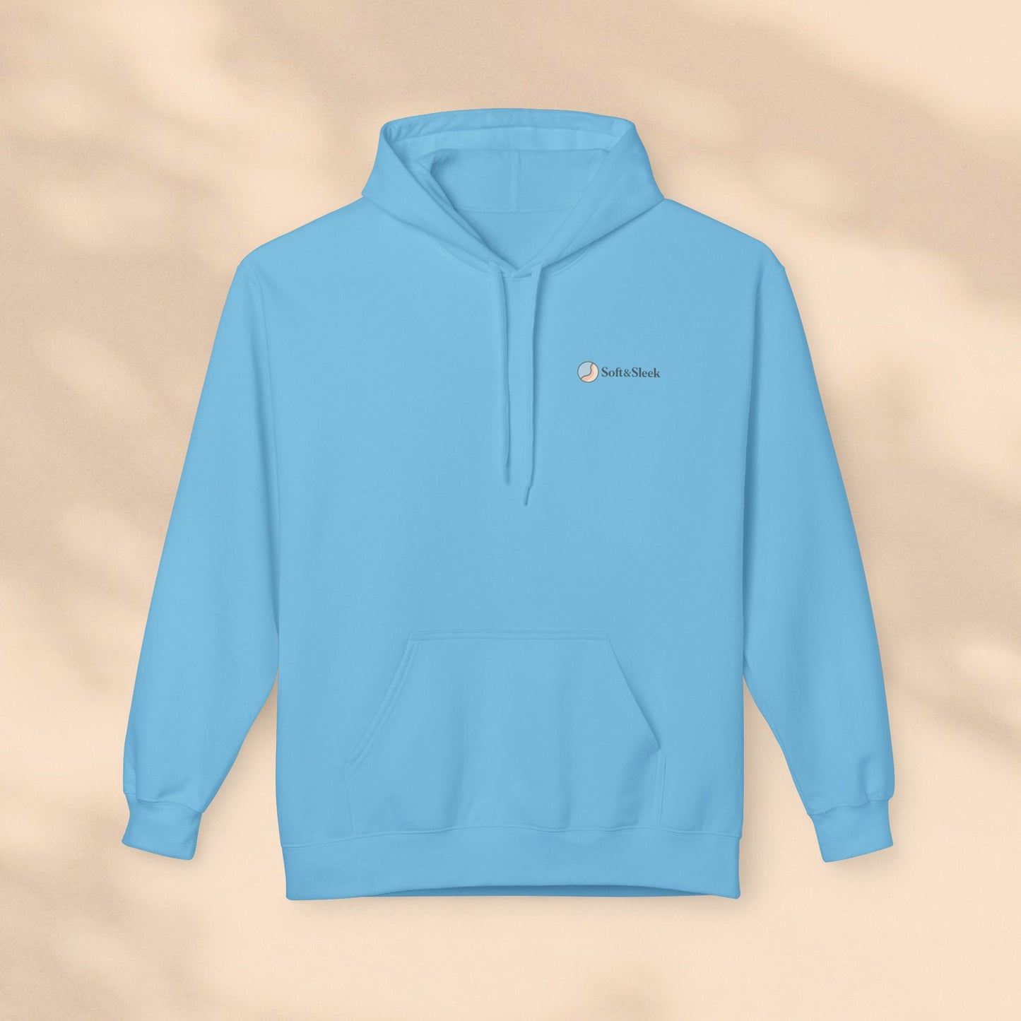 Light blue hoodie with a brand logo on a beige background