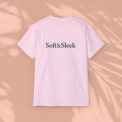 Pink Soft & Sleek t-shirt with logo on back, peach background