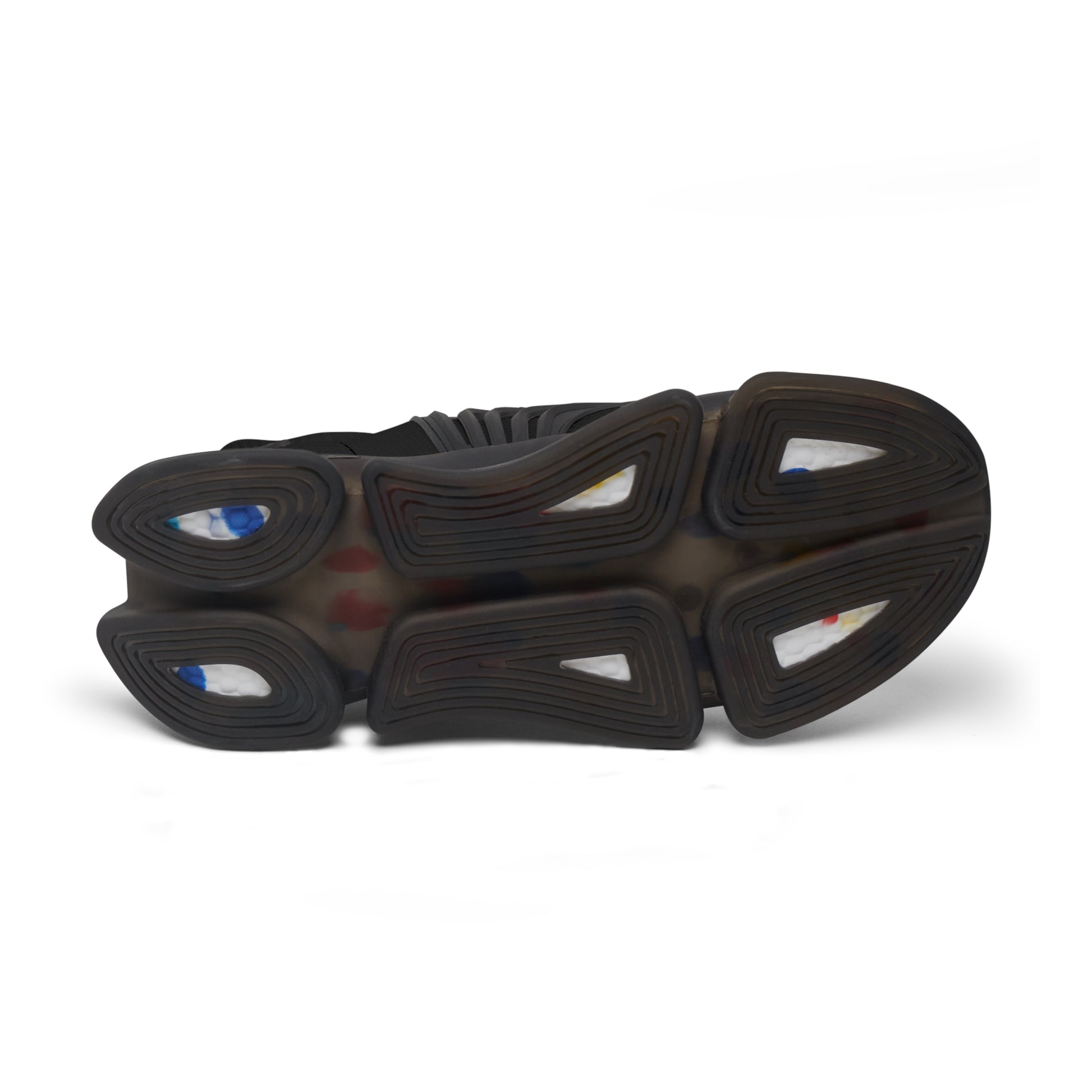 Underside view of black Soft & Sleek trainer showing tread pattern and midsole detail.