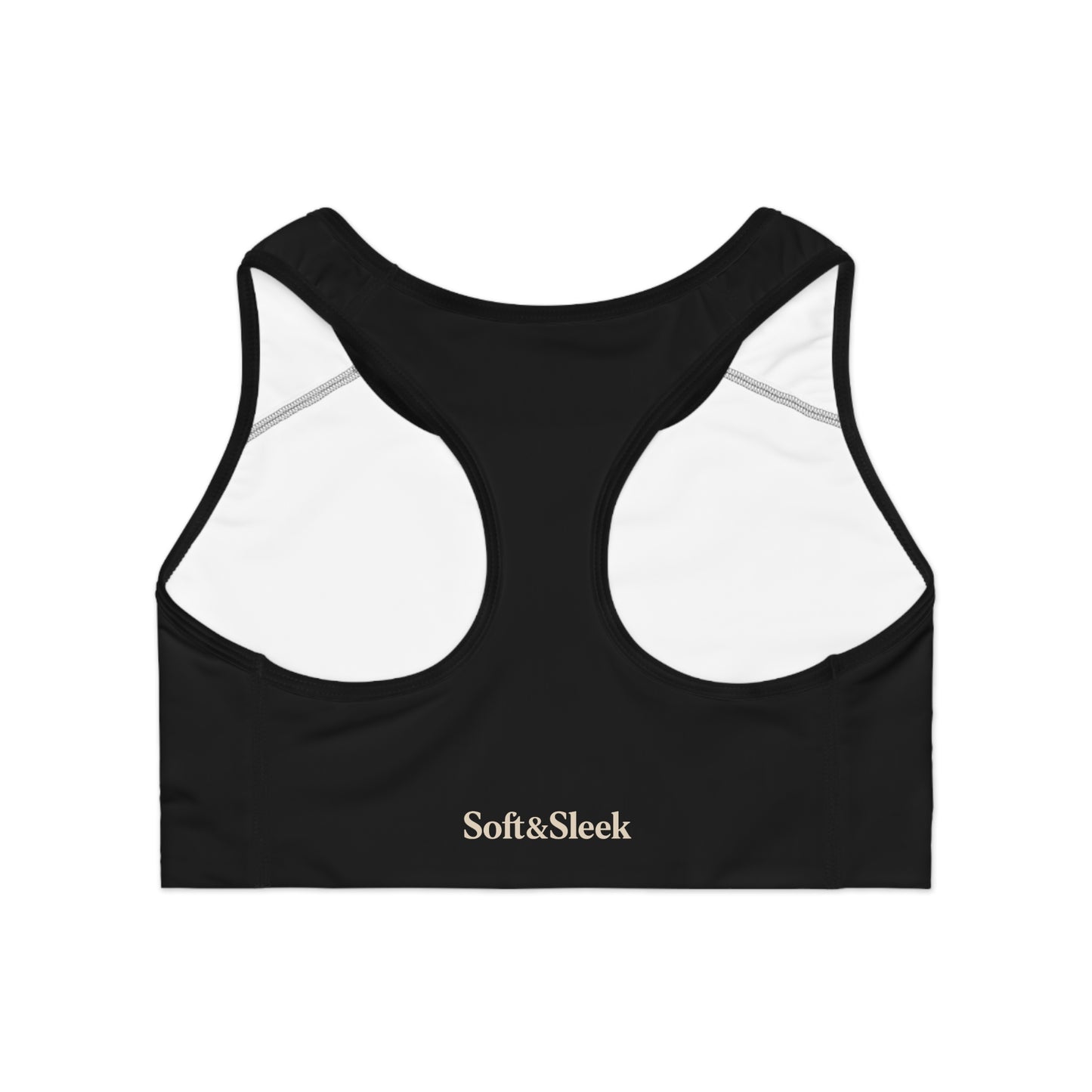 Rear flat lay of black Soft & Sleek sports bra showing racerback design and interior white lining with logo printed on back band.