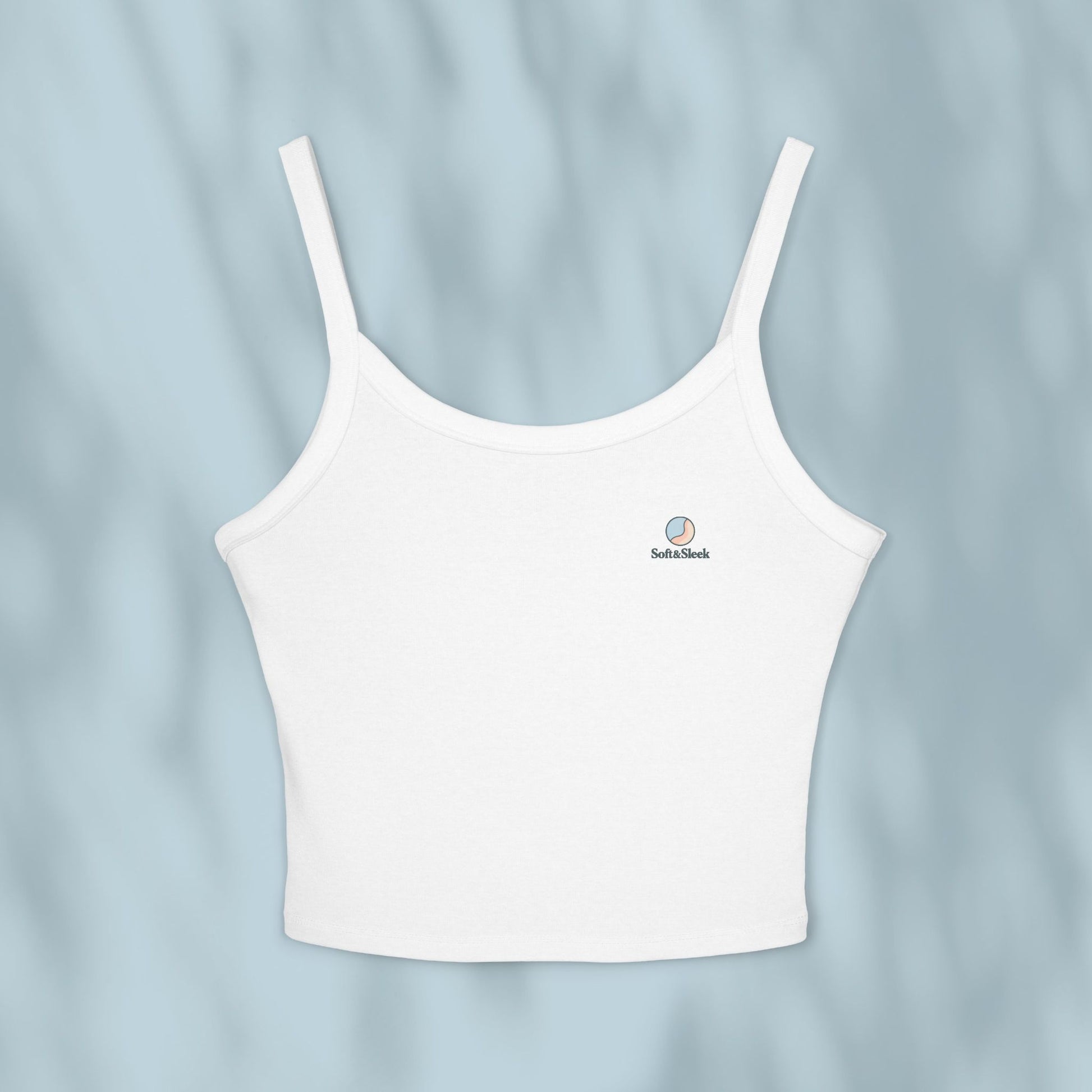 White camisole on a light blue background