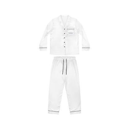 Flat lay front view of Soft & Sleek white satin pyjama set with black piping and button-up shirt.