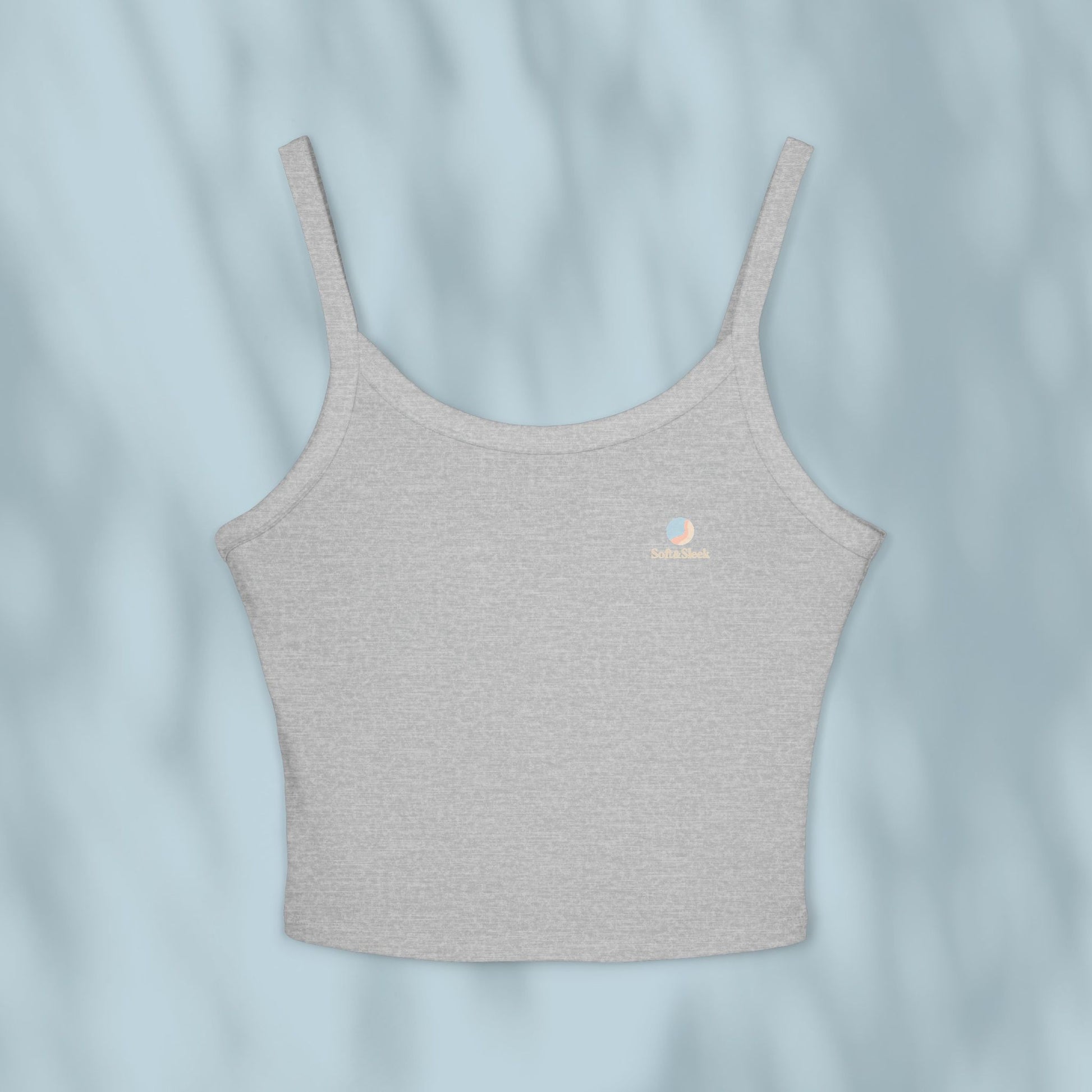 Gray tank top with a brand logo on a light blue background