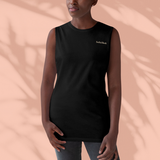 Flat lay of white Soft & Sleek lounge shorts with logo printed on the lower leg, front-facing.