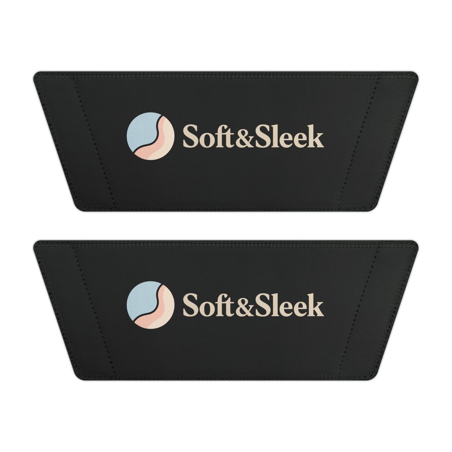 Flat lay of two black Soft & Sleek slide straps showing logo and emblem placement side by side