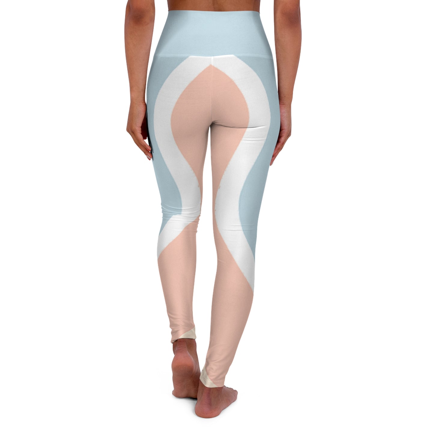 Rear view of woman in Soft & Sleek cropped leggings showing full curved pastel colour-block design from waist to calves