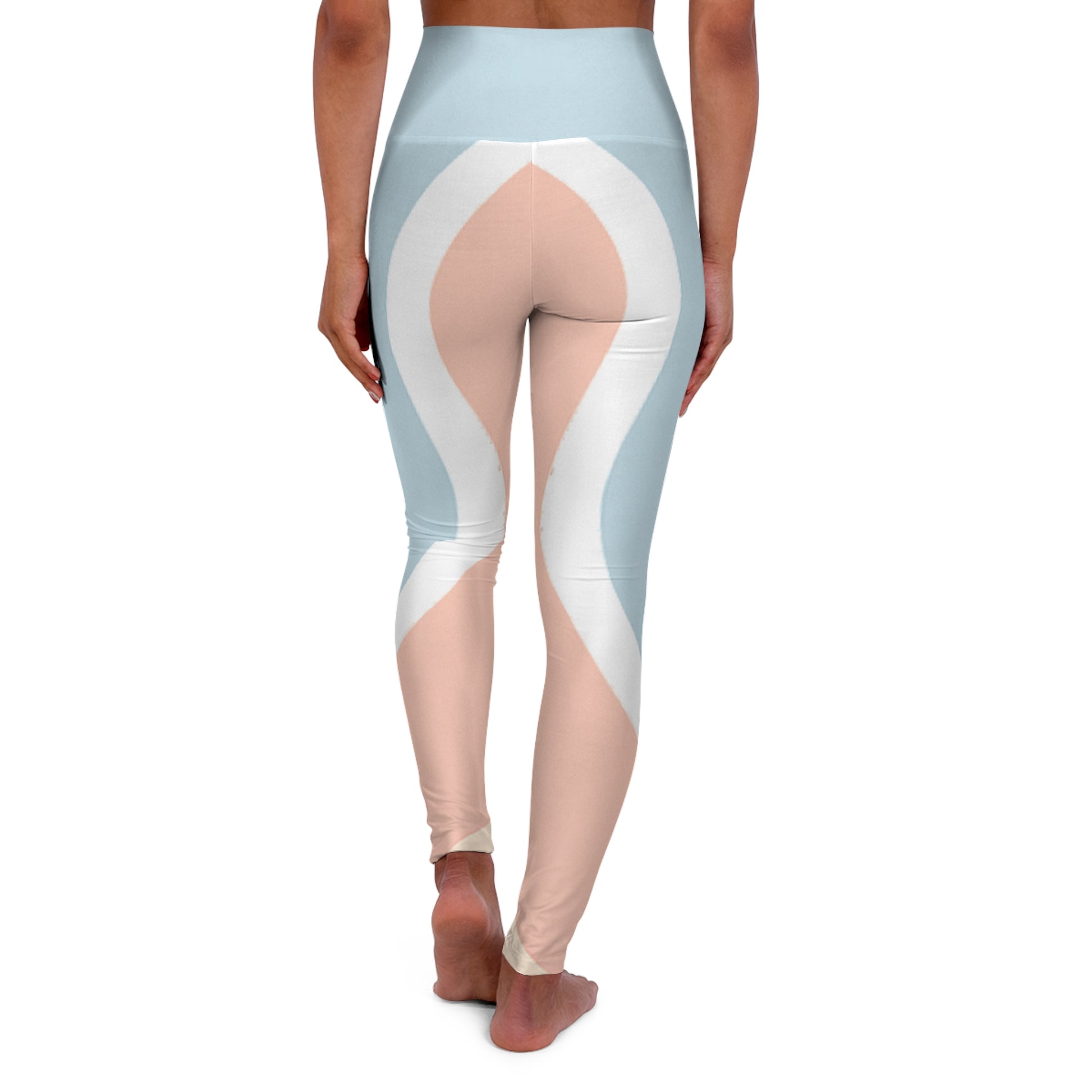 Rear view of woman in Soft & Sleek cropped leggings showing full curved pastel colour-block design from waist to calves