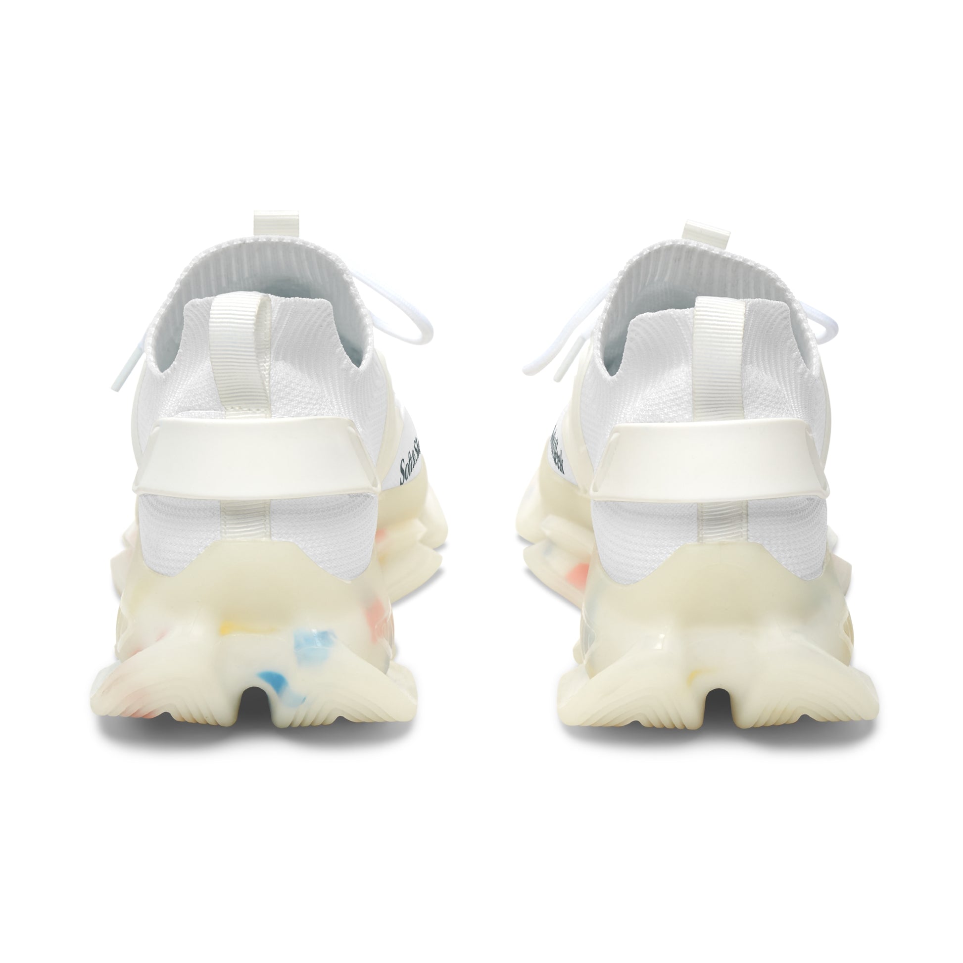 White sneakers with colorful sole on a white background