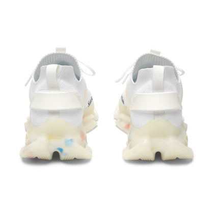 White sneakers with colorful sole on a white background