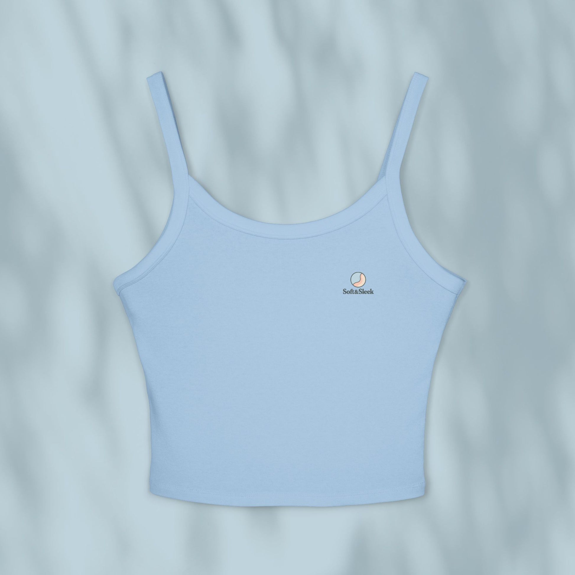 Light blue tank top with a brand logo on a light gray background