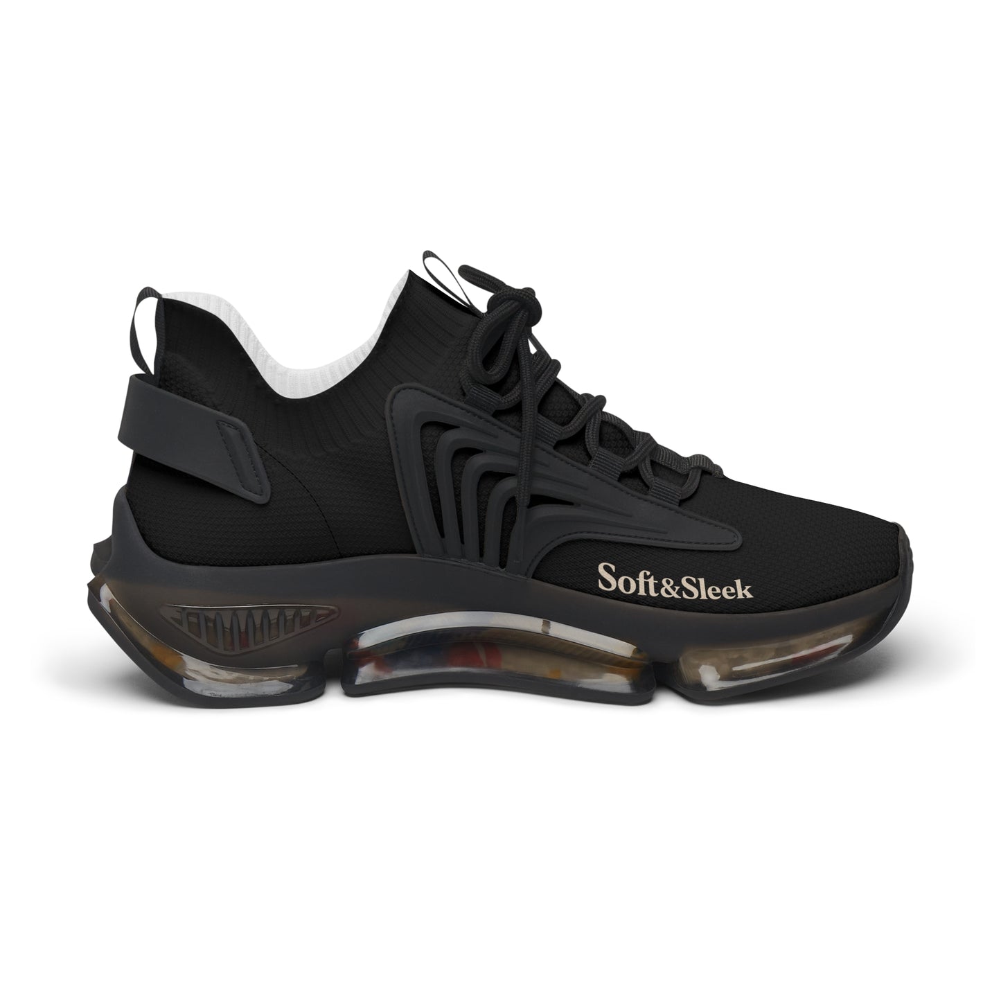 Outer side profile of a single black Soft & Sleek trainer with curved sole detail.