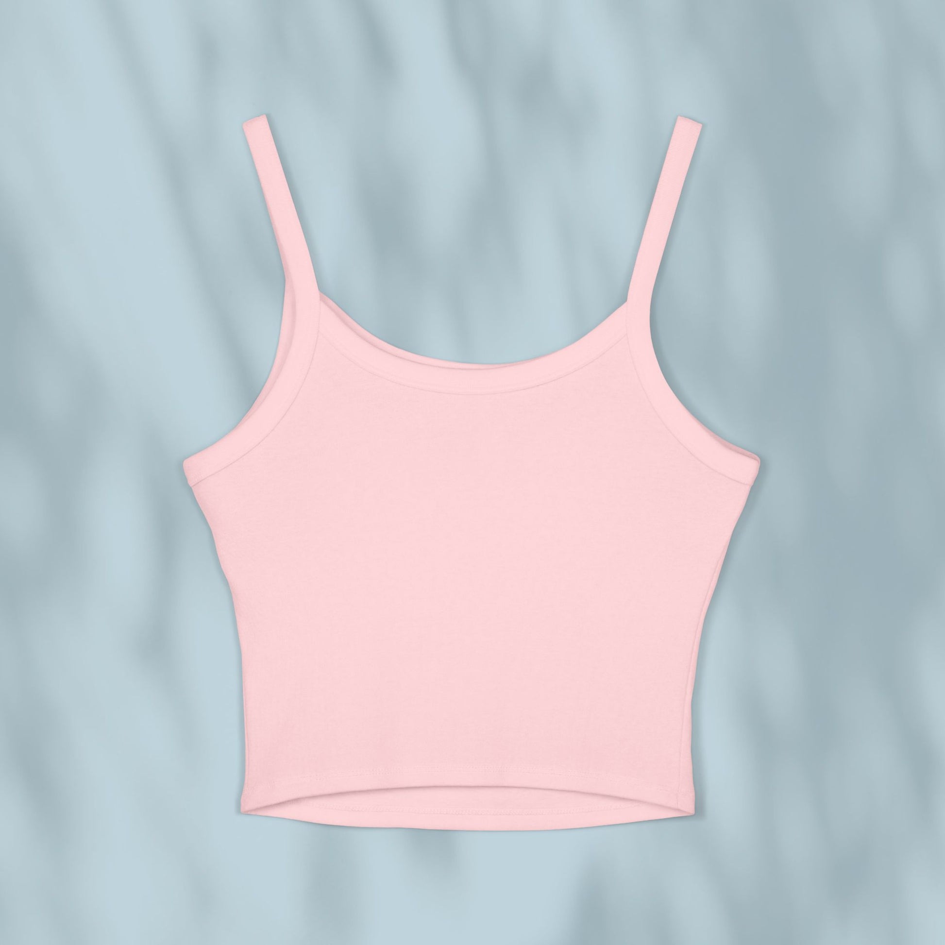 Pink tank top on a light blue background