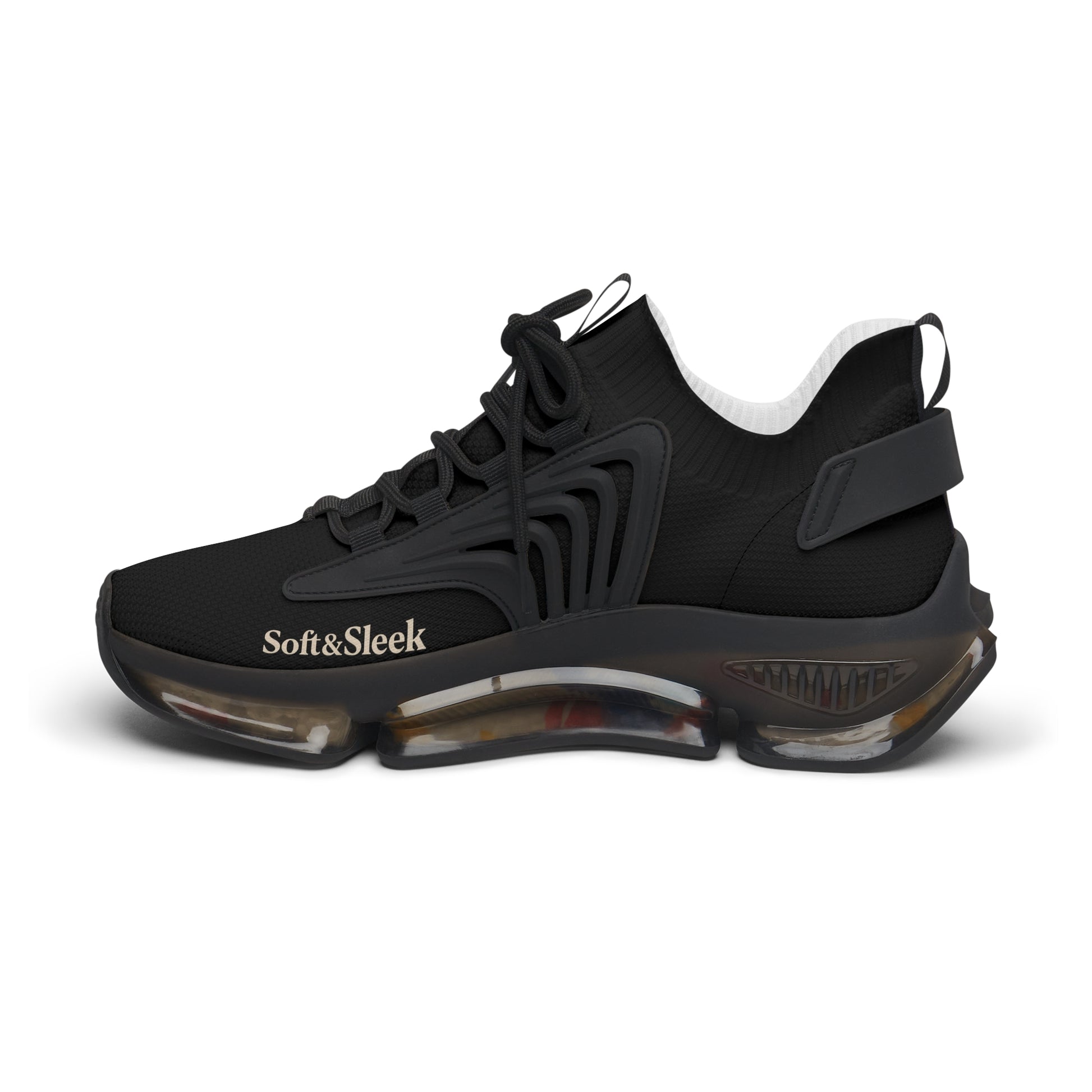 Angled view of black Soft & Sleek trainers from the front side, logo and structure visible.