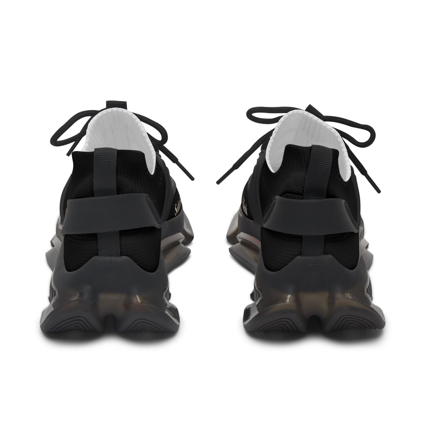 Rear view of black Soft & Sleek trainers showing pull tabs and sole structure.