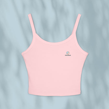 Pink tank top with a brand logo on a light blue background