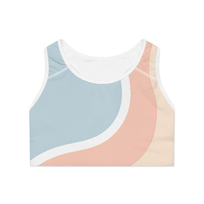 Flat lay front view of multicolour Soft & Sleek sports bra with abstract pastel wave pattern