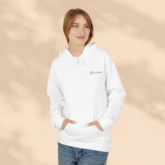 Person wearing a white hoodie with a logo on a beige background