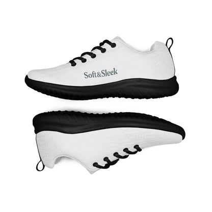 Top-down view of white Soft & Sleek sneakers with black laces and black soles, placed side by side.