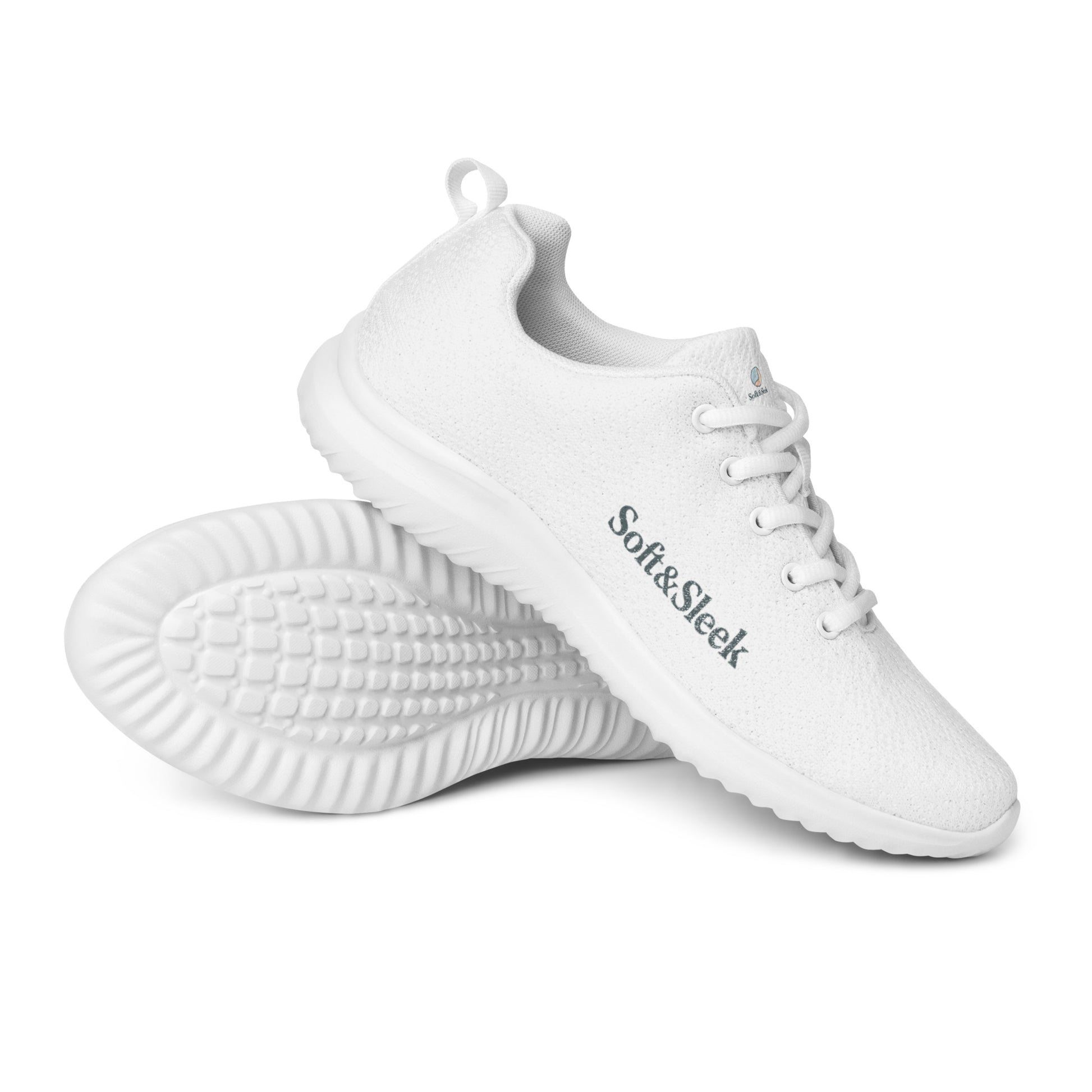 Angled view of a white Soft & Sleek sneaker stacked atop another to show sole and side.