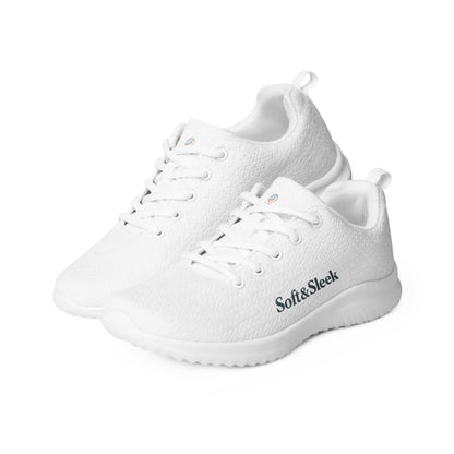 Angled view of two floating white Soft & Sleek sneakers side by side.